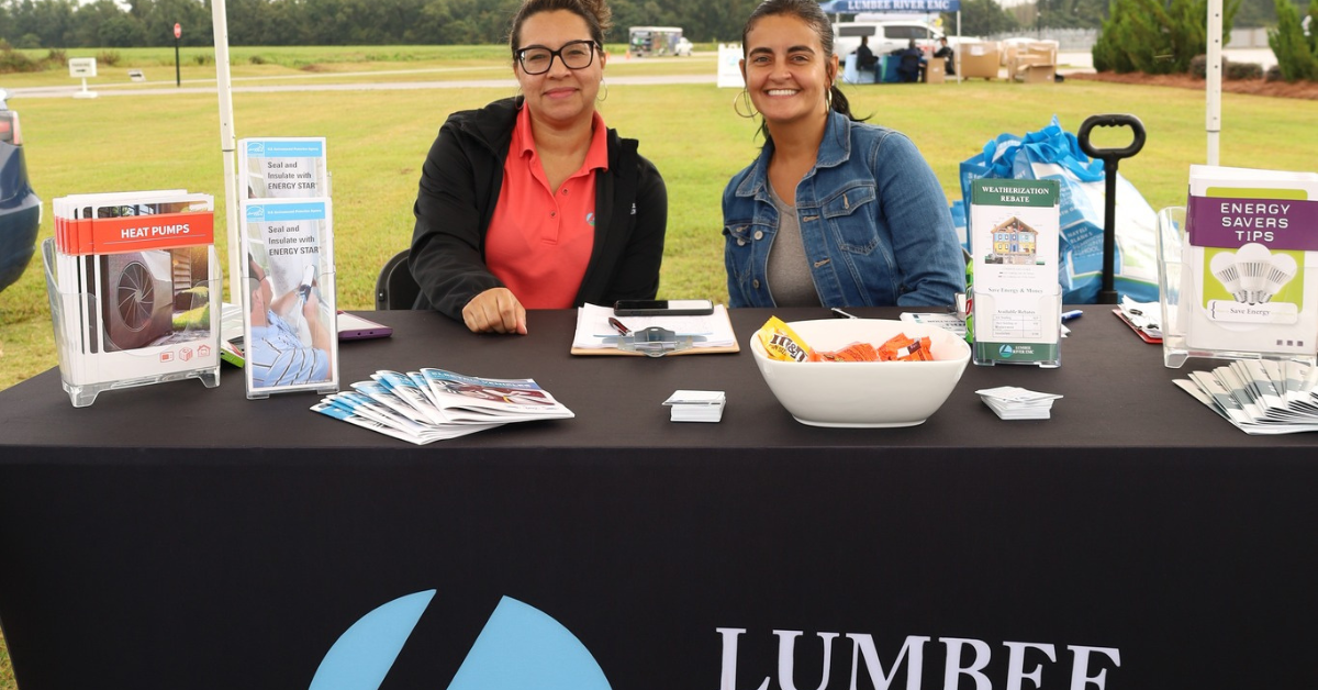 Lumbee River EMC team at a table